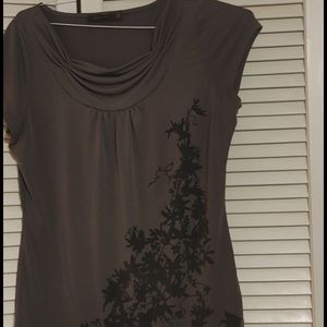 Women grey blouse with black design in front